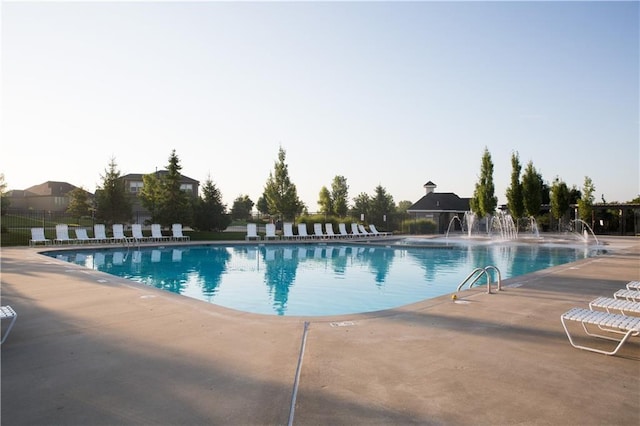 view of pool featuring a patio