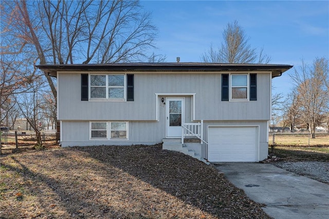 bi-level home featuring a garage