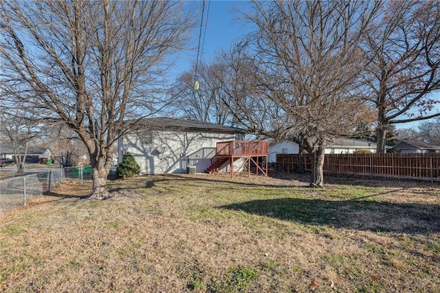 view of yard featuring a wooden deck