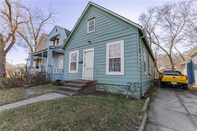 bungalow-style home with a porch