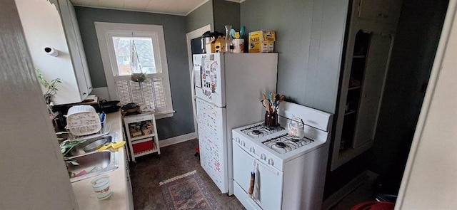 kitchen with washer / clothes dryer and white gas stove