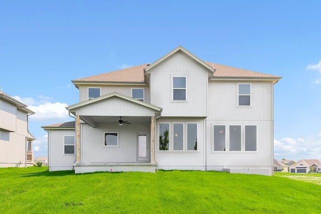 17157 W 164th Ter, Olathe, KS 66062 - back of house featuring a ceiling fan, a lawn, and roof with shingles