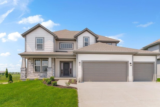 17157 W 164th Ter, Olathe, KS 66062 - view of front of house featuring an attached garage, driveway, a front lawn, and a shingled roof