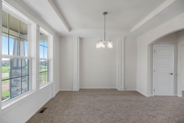 17157 W 164th Ter, Olathe, KS 66062 - empty room with carpet flooring, a raised ceiling, and arched walkways