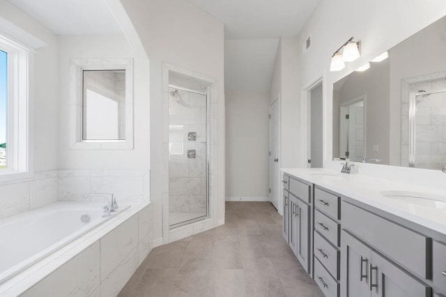 17157 W 164th Ter, Olathe, KS 66062 - full bath featuring double vanity, a garden tub, and a shower stall