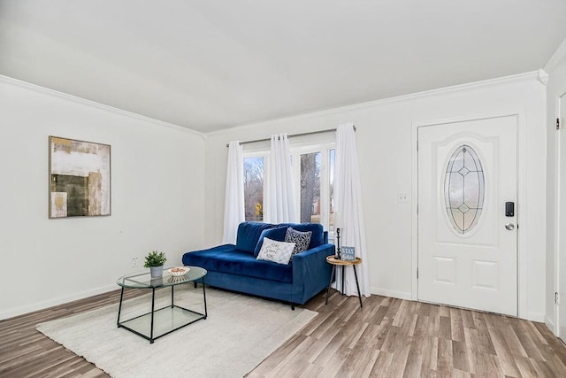 living room featuring crown molding and wood-type flooring