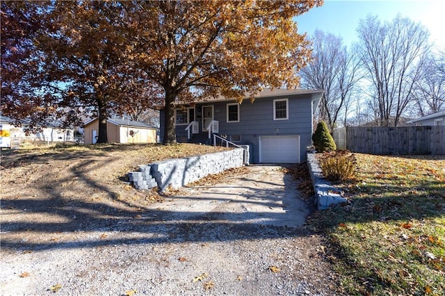 view of front of property with a garage