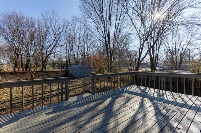 deck featuring a storage shed