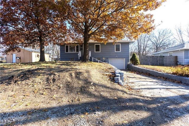 single story home featuring a garage