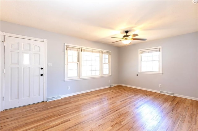 entrance foyer featuring ceiling fan and light hardwood / wood-style flooring