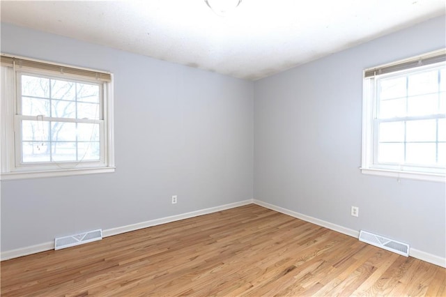 empty room featuring light hardwood / wood-style flooring