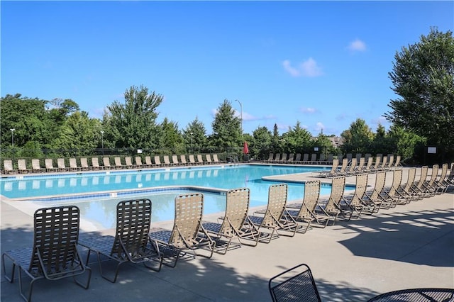 view of swimming pool with a patio area