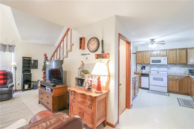 living room featuring ceiling fan