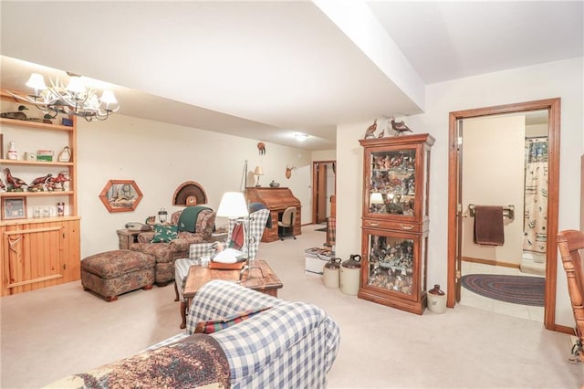 carpeted living room with a notable chandelier