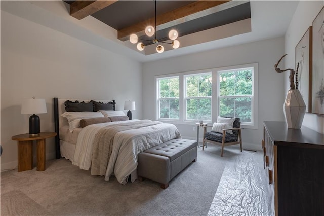 carpeted bedroom with an inviting chandelier and beamed ceiling