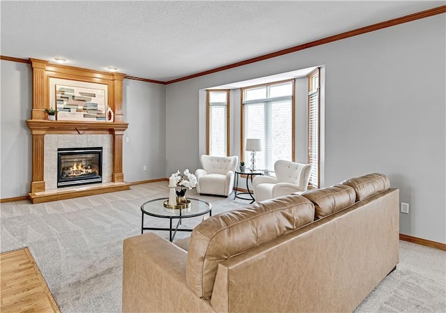 carpeted living room with crown molding and a fireplace