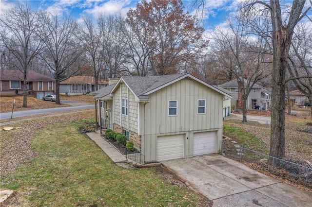 view of property exterior with a garage