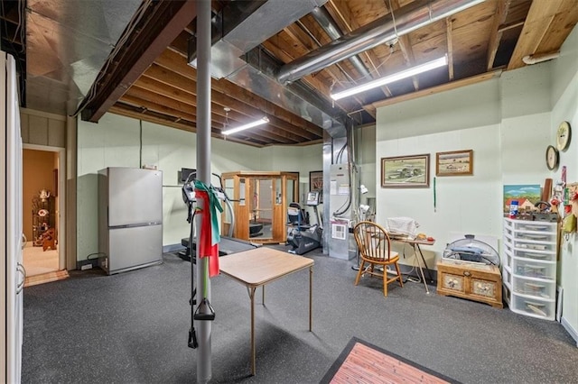 basement with white fridge