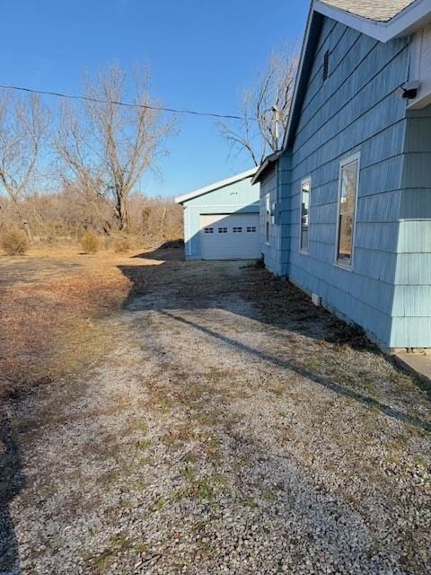 view of home's exterior with a garage