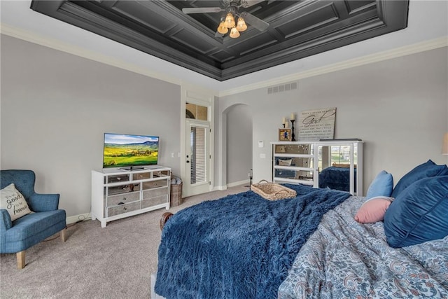 bedroom with ceiling fan, ornamental molding, carpet floors, and coffered ceiling