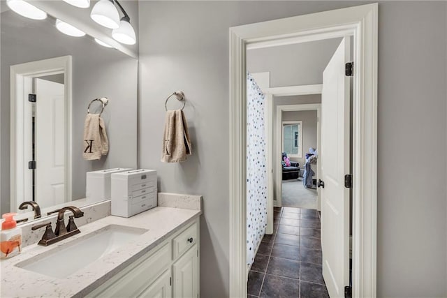 bathroom featuring tile patterned floors and vanity