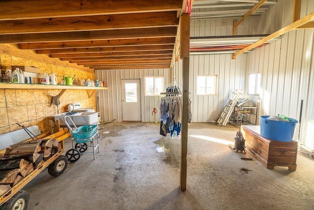 misc room with concrete flooring