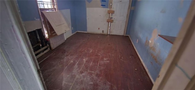 foyer entrance with hardwood / wood-style floors