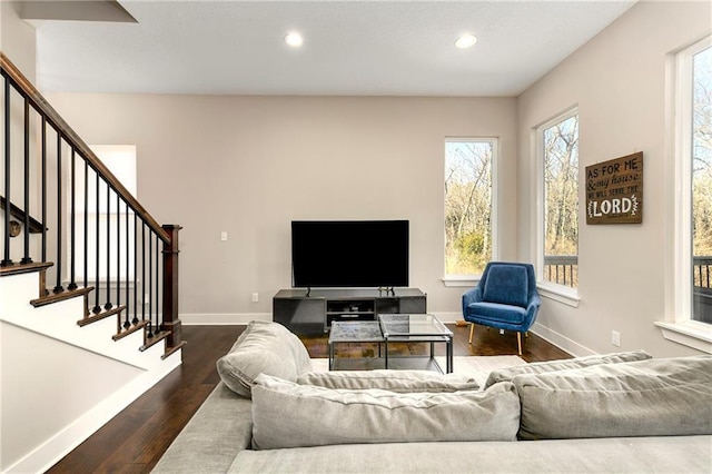 22404 W 76th St, Shawnee, KS 66227 - living room featuring dark wood-type flooring, plenty of natural light, stairs, and recessed lighting