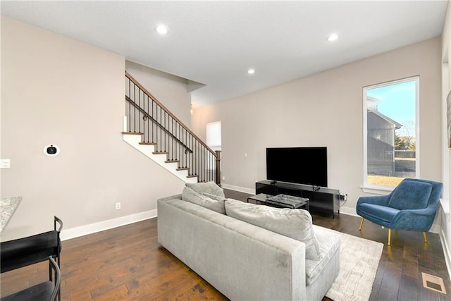 22404 W 76th St, Shawnee, KS 66227 - living room featuring baseboards, dark wood-style floors, healthy amount of natural light, recessed lighting, and stairway