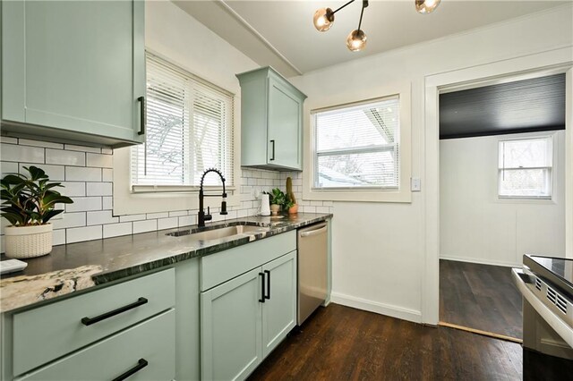 4412 N Jackson Ave, Kansas City, MO 64117 - kitchen featuring stainless steel appliances, plenty of natural light, and sink