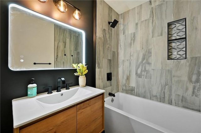 4412 N Jackson Ave, Kansas City, MO 64117 - bathroom featuring vanity and tiled shower / bath
