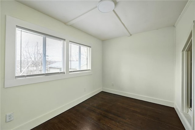 4412 N Jackson Ave, Kansas City, MO 64117 - unfurnished room with dark hardwood / wood-style floors