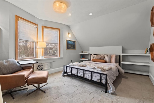 bedroom with vaulted ceiling