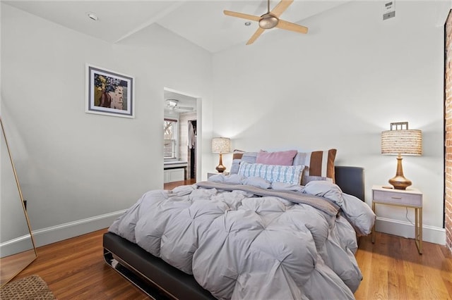 bedroom with ceiling fan and light hardwood / wood-style floors