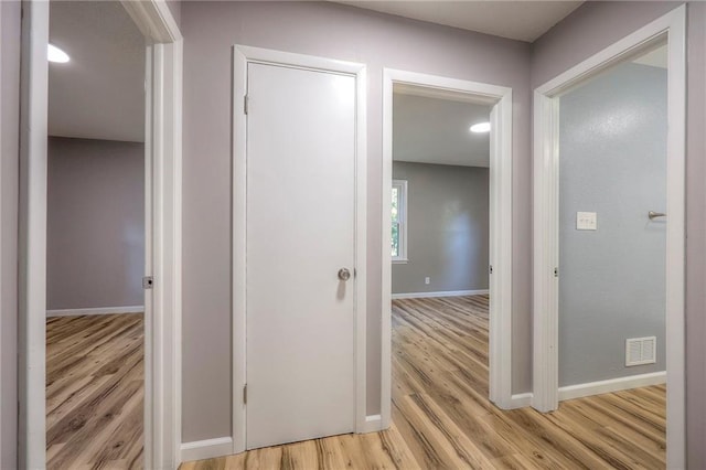 hall featuring light wood-type flooring