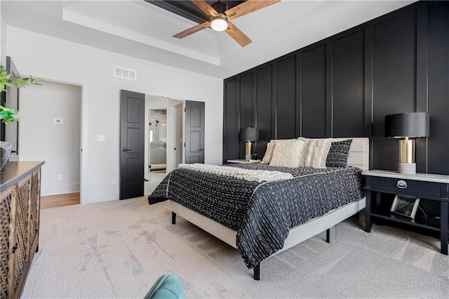 16781 S Fellows St, Olathe, KS 66062 - bedroom with a raised ceiling, light colored carpet, and a ceiling fan