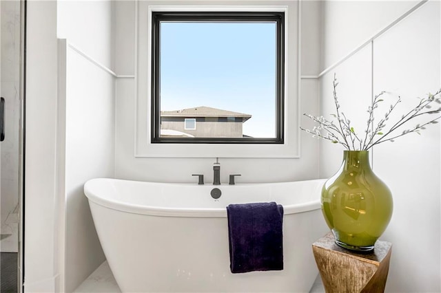 16781 S Fellows St, Olathe, KS 66062 - full bath featuring a soaking tub and plenty of natural light