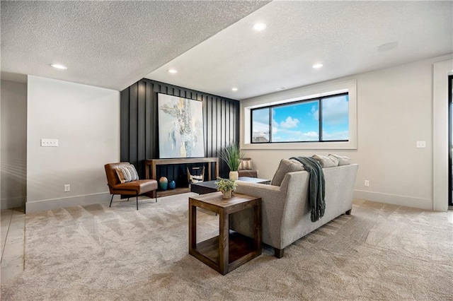 16781 S Fellows St, Olathe, KS 66062 - living area with light carpet, a textured ceiling, and recessed lighting