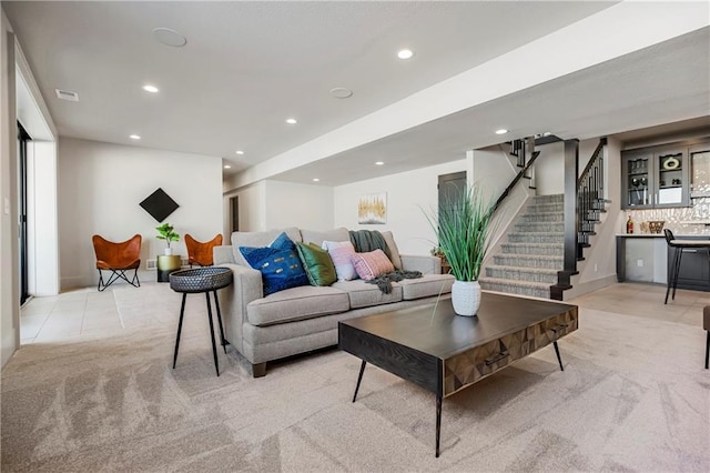 16781 S Fellows St, Olathe, KS 66062 - living room with light carpet, recessed lighting, and stairway