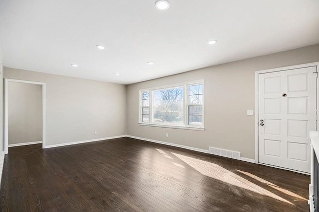 interior space with dark wood-type flooring