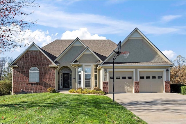 view of front of home with a garage and a front yard