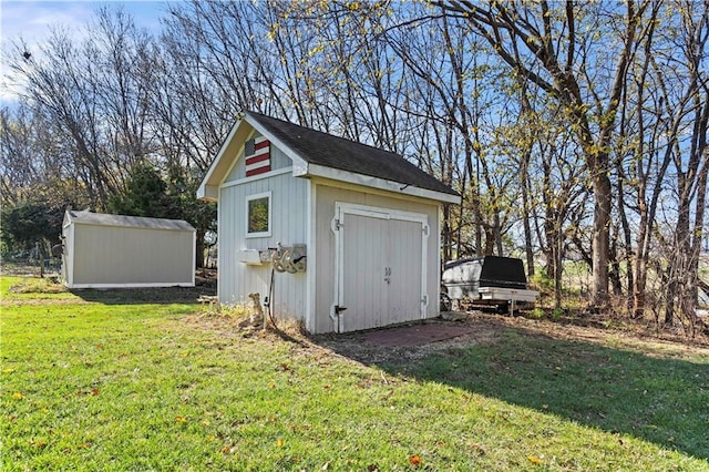 view of outdoor structure with a lawn