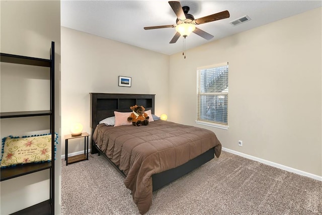 carpeted bedroom with ceiling fan