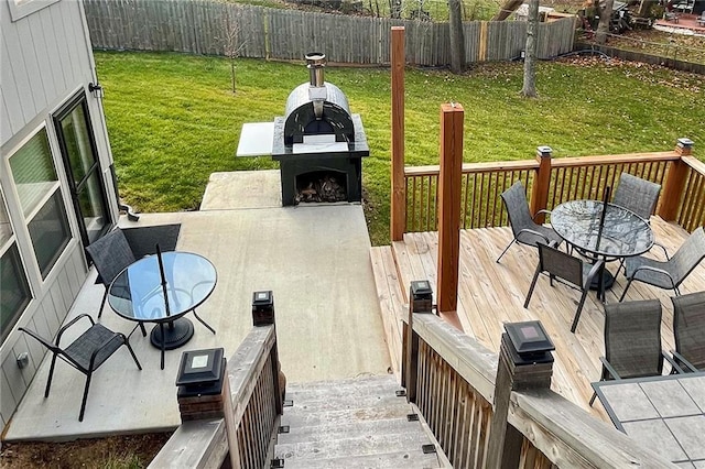 deck featuring a lawn