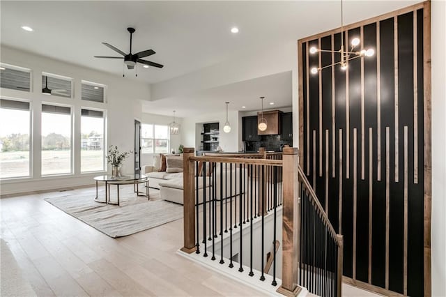 8309 NW 90th St, Kansas City, MO 64153 - living room featuring a ceiling fan, light wood finished floors, and recessed lighting