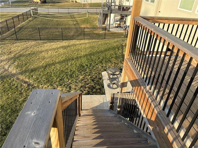 wooden terrace with a yard