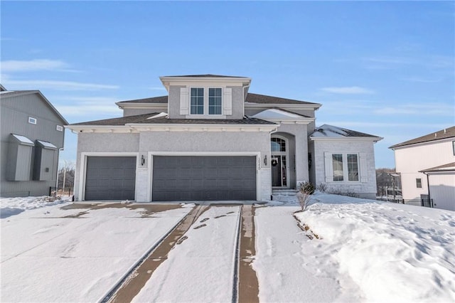 view of front of home with a garage