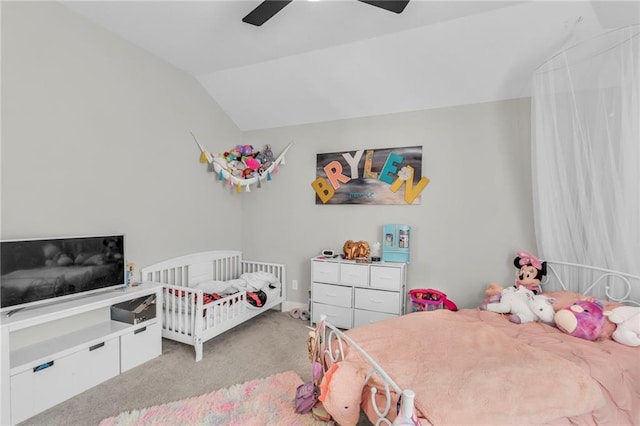 bedroom featuring ceiling fan, light colored carpet, and lofted ceiling