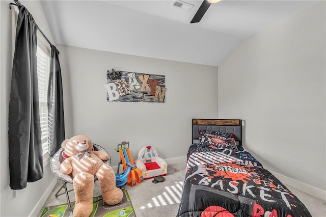 bedroom featuring carpet, visible vents, vaulted ceiling, and baseboards