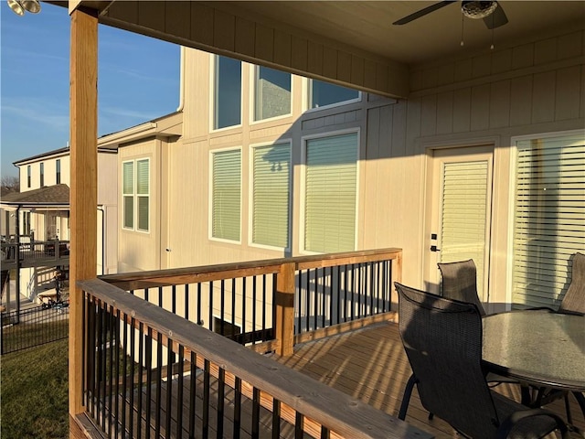 wooden deck with ceiling fan